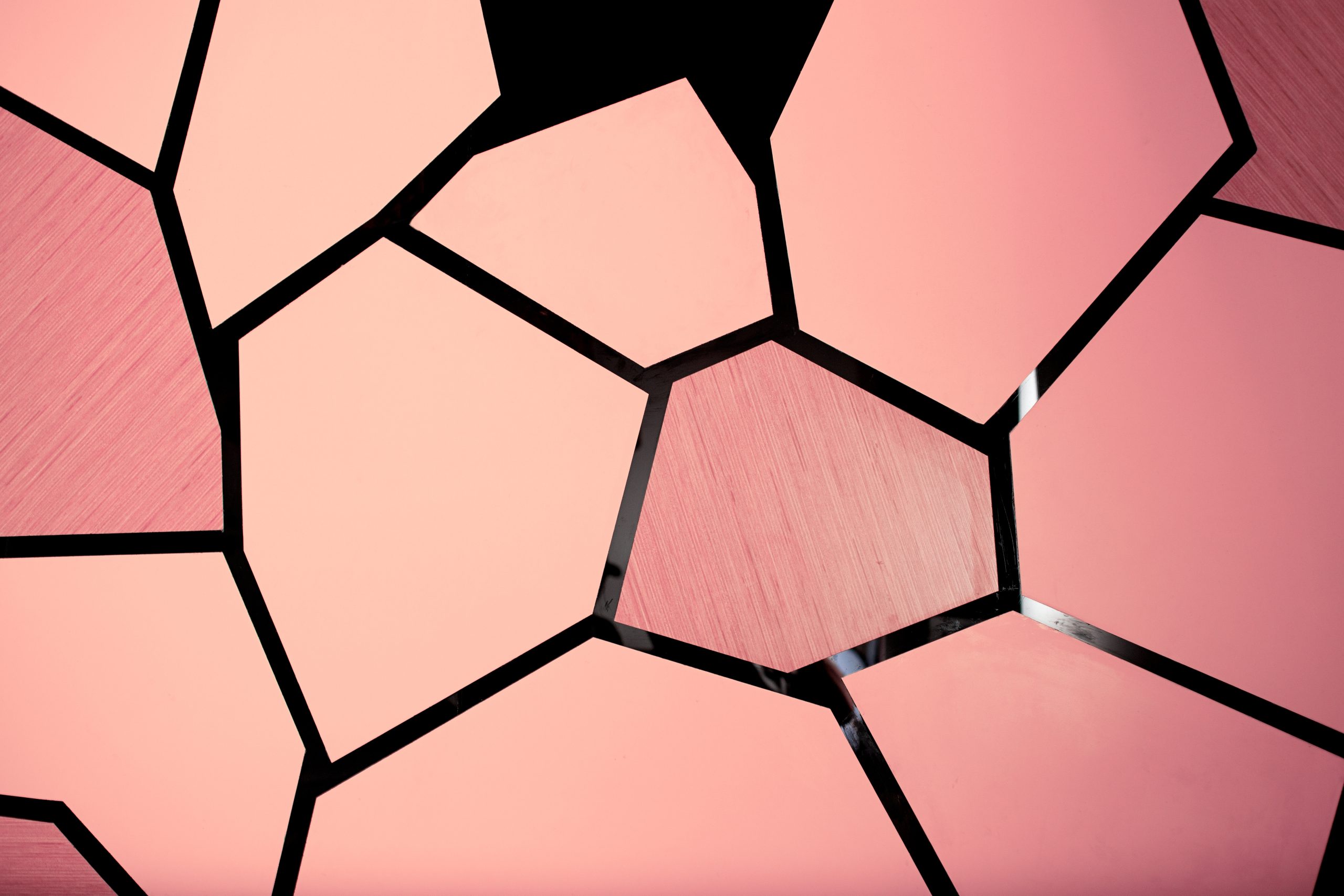 Abstract pink geometric pattern illustrating business complexity.