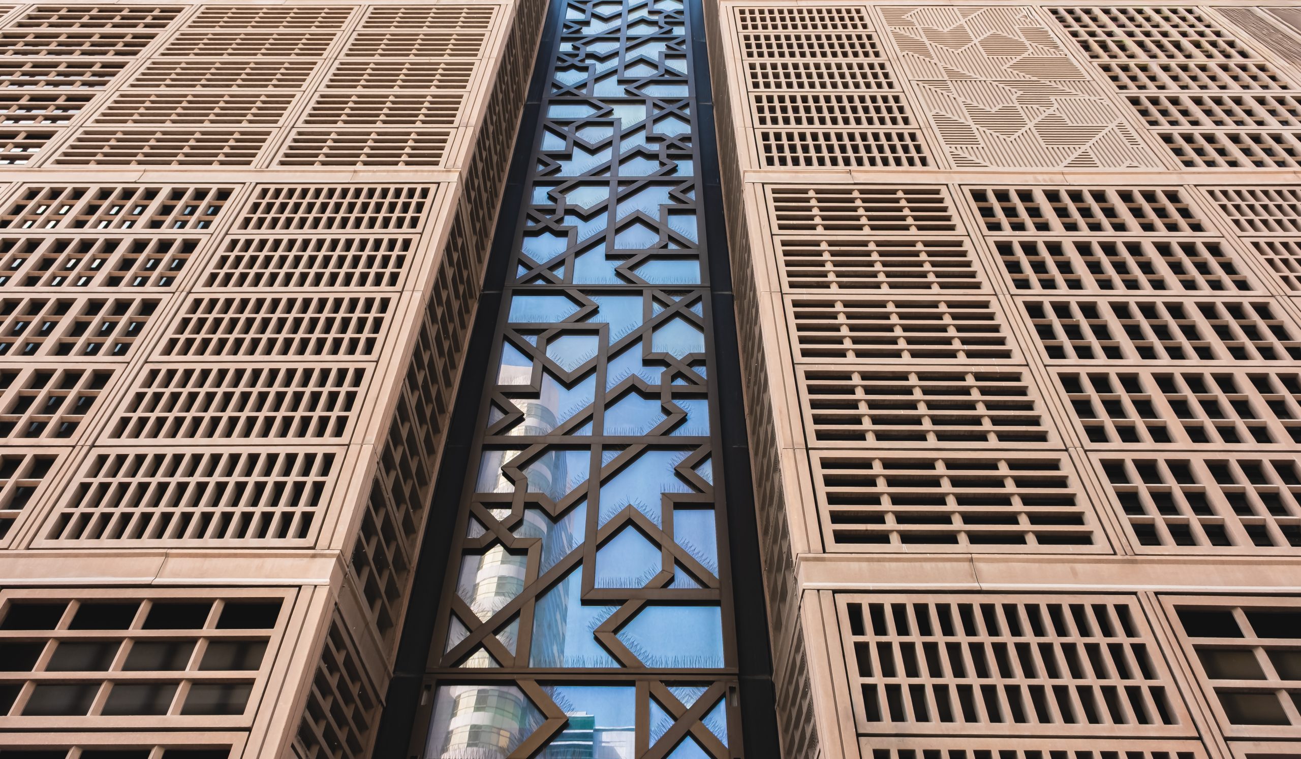 Modern building facade with geometric patterns.
