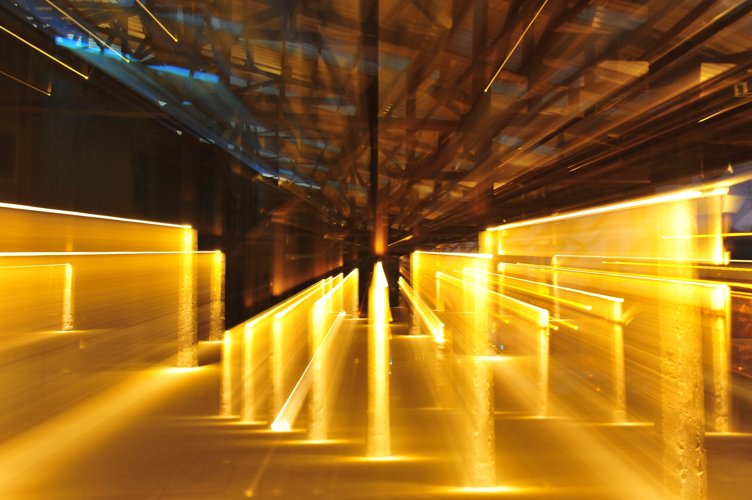 Abstract light trails in industrial setting