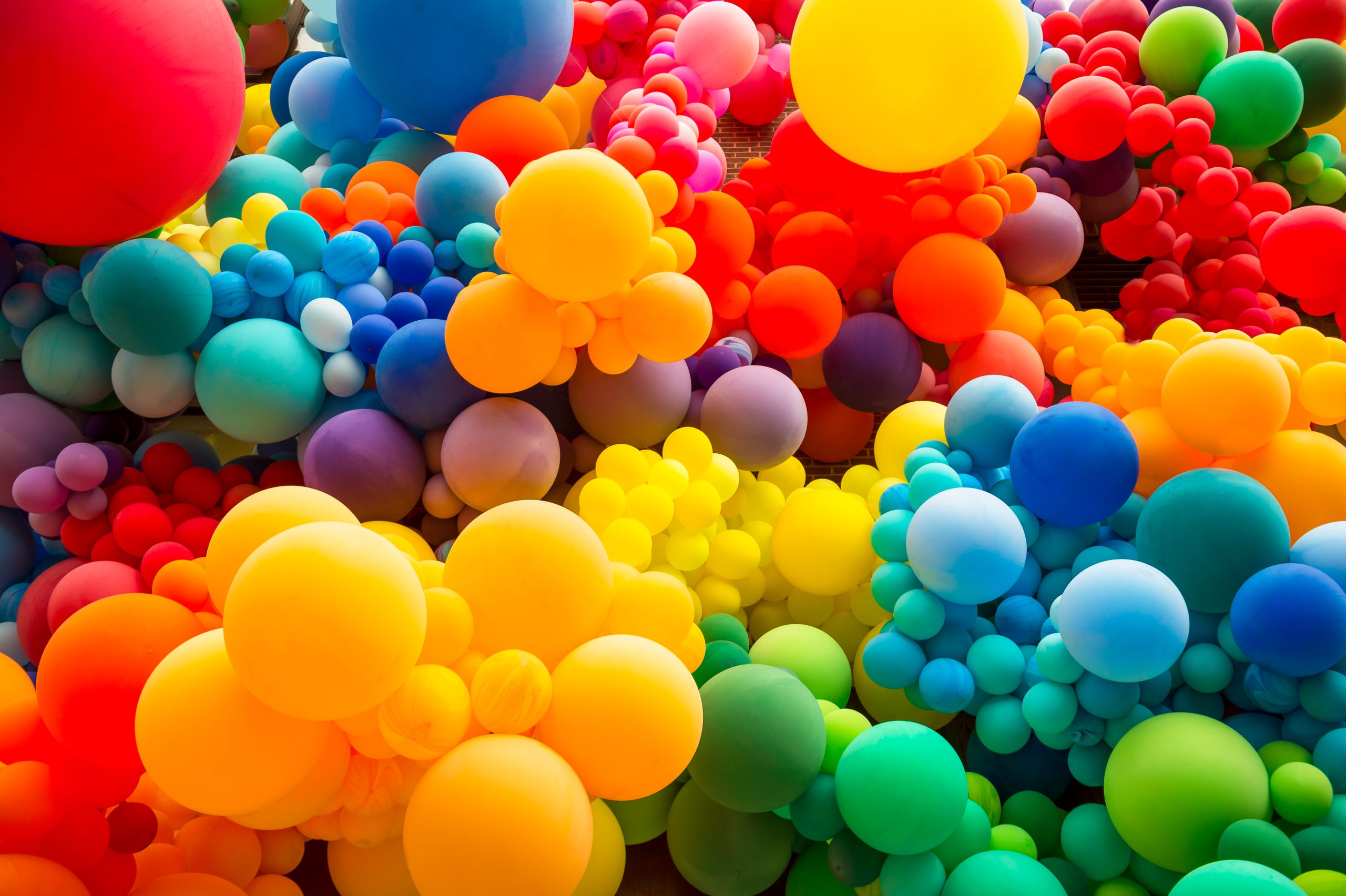 Colourful rainbow balloons representing LGBTQ+ Pride and diversity in the UK