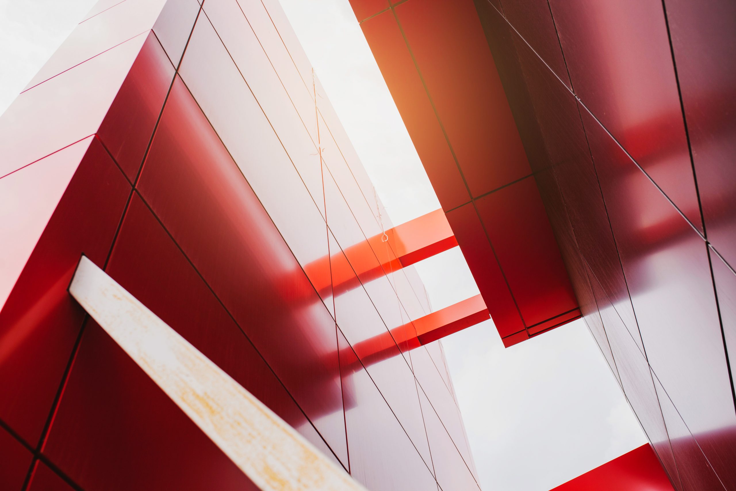 Abstract red architectural panels representing structure, controls and risk under Solvency UK