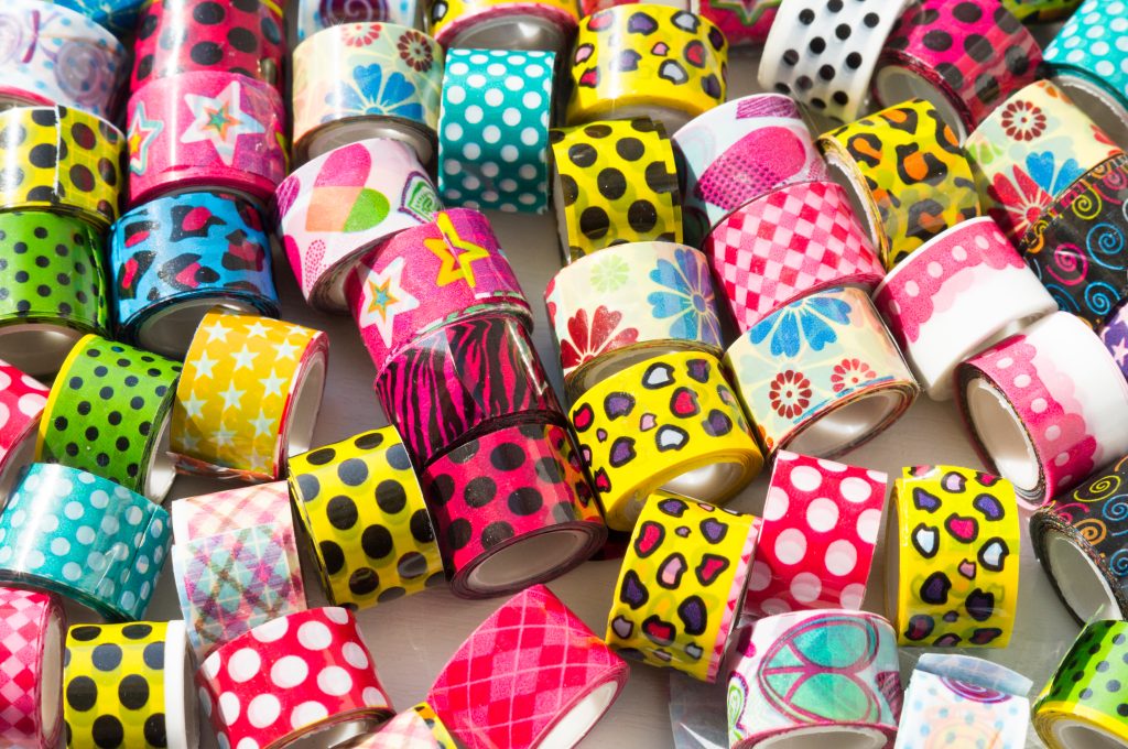 Printed adhesive tape rolls manufactured for retail, industrial and distribution markets