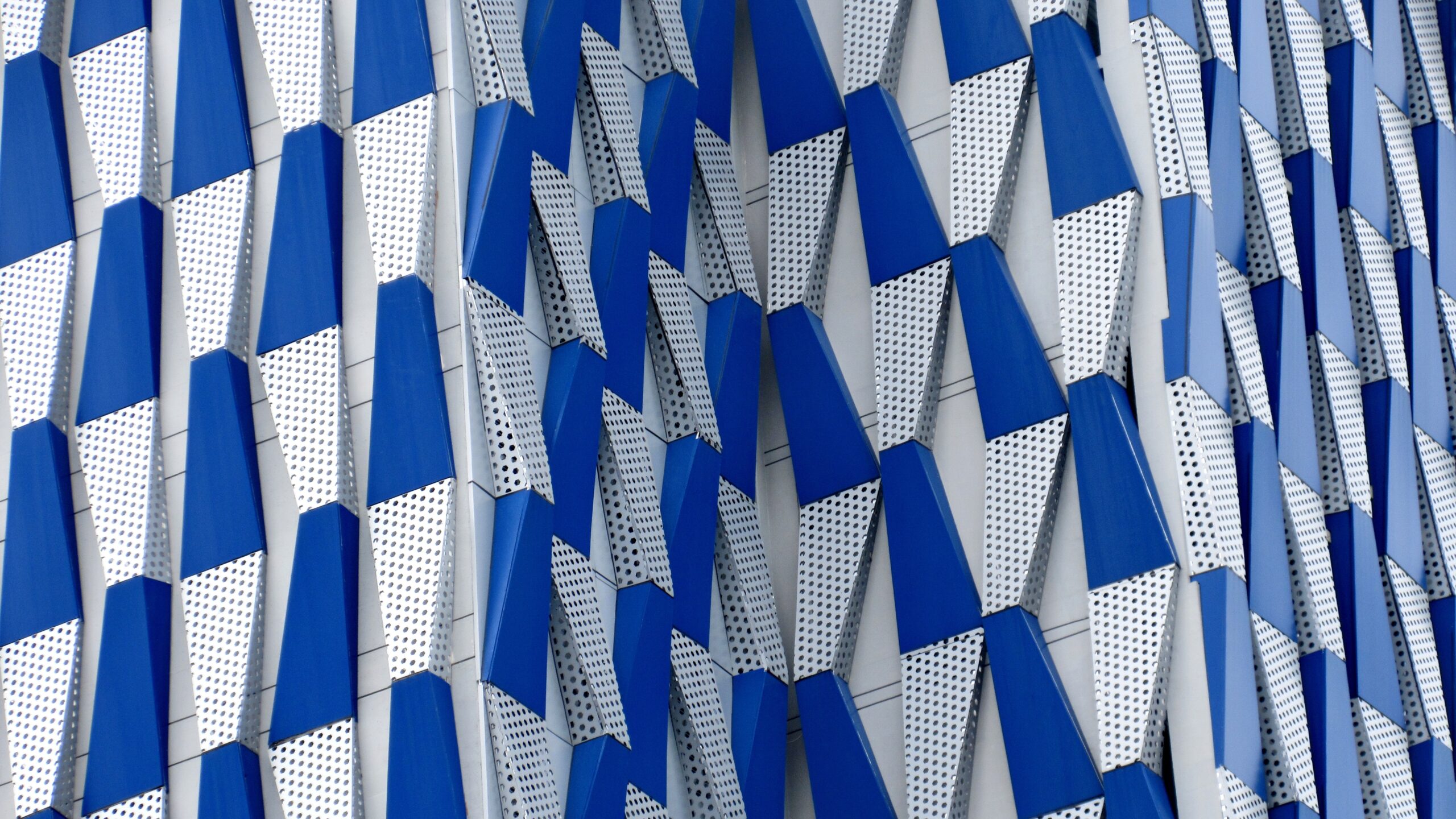 Blue and silver geometric architectural facade
